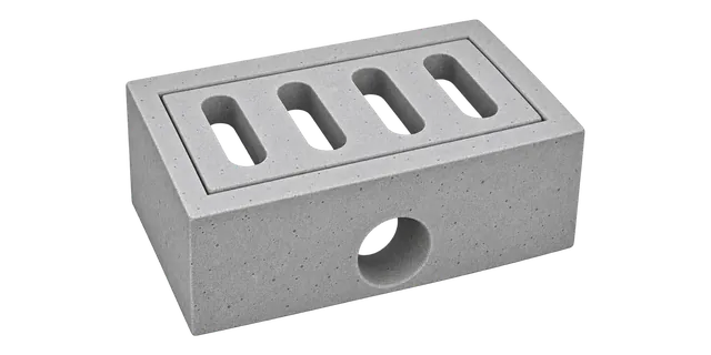 Precast concrete catch pit with a concrete grating and a round outlet